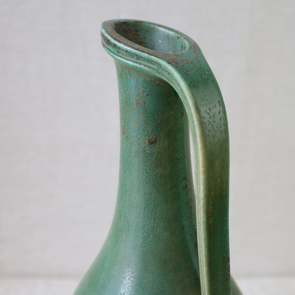 Detail of brown ferric dapples on a green glaze Gunnar Nylund vase, Rorstrand Sweden, 1940's