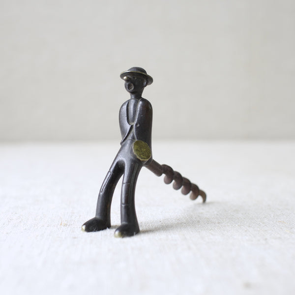 A rare 1950s brass corkscrew by Richard Rohac, titled "Vagabond." Made in Vienna, Austria, this piece is a fine example of Rohac's Modernist approach to everyday items.