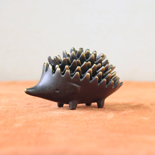 A genuine Walter Bosse hedgehog ashtray known for its sleek, minimalistic design. This rare collectible item represents the Modernist charm and craftsmanship of 1950s