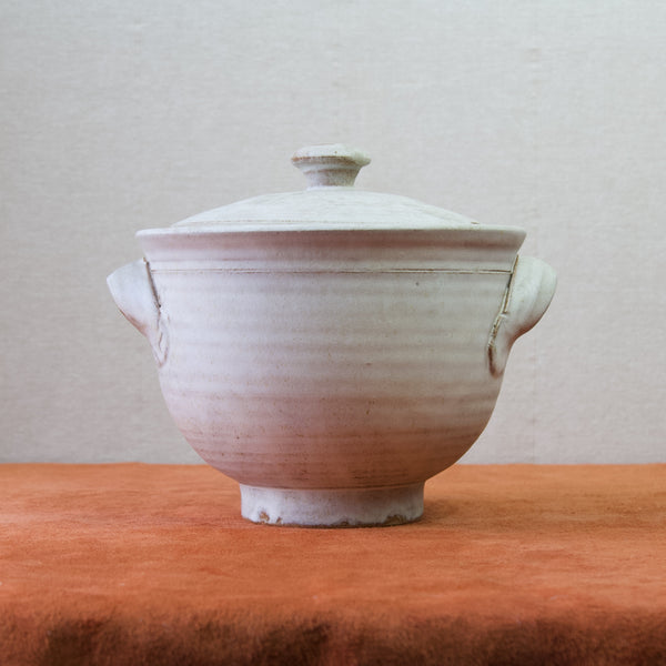 Emmanuel cooper's early work in stoneware, a tureen with running oatmeal glaze.