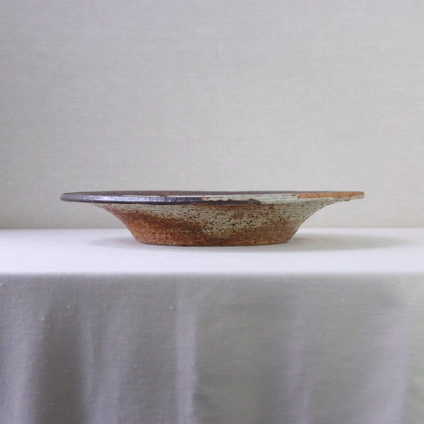 Bold 1970s rustic bowl by Annikki Hovisaari for Arabia Finland, inspired by nature and earthy Scandinavian aesthetics.