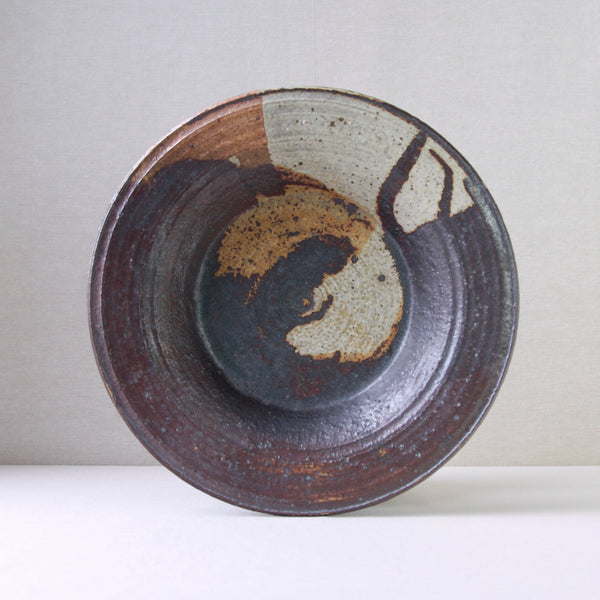 1970s studio pottery by Annikki Hovisaari for Arabia, Finland, in a bold iron-rich glaze with earthy amber and brown hues.