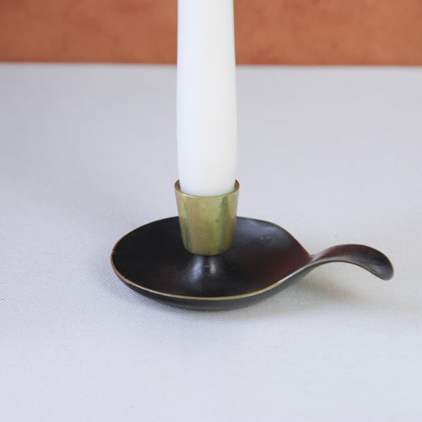 Sleek and stylish Karl Hagenauer round brass candle holder, embodying mid-century modernist design from Vienna's renowned Hagenauer workshop.