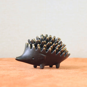 This rare and genuine Walter Bosse hedgehog ashtray combines sleek Modernist design with a cute, playful form. A perfect addition for collectors of mid-century Viennese artistry.