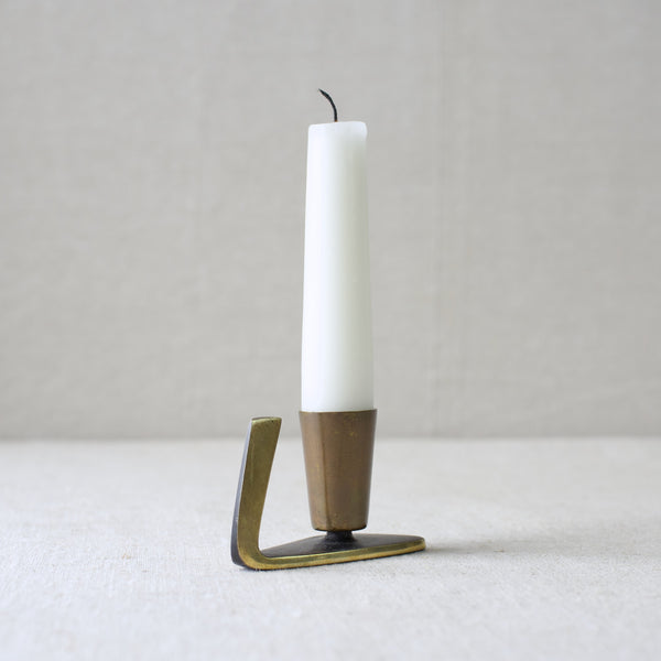 A 1950s brass chamberstick by Karl Hagenauer, combining the Art Deco and Modernist styles for which Viennese metalwork is known. An elegant and collectible item, perfect for mid-century design lovers.