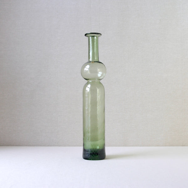 Neptuna vase by Nanny Still for Riihimaen Lasi Oy, with an optical mould texture in soft green, classic mid-century Finnish design.