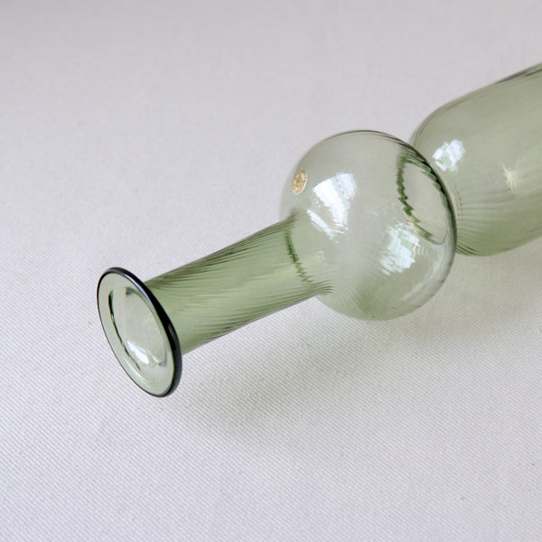 Nanny Still Neptuna glass vase in pale green with textured details, made at Riihimaki; modernist homeware design.