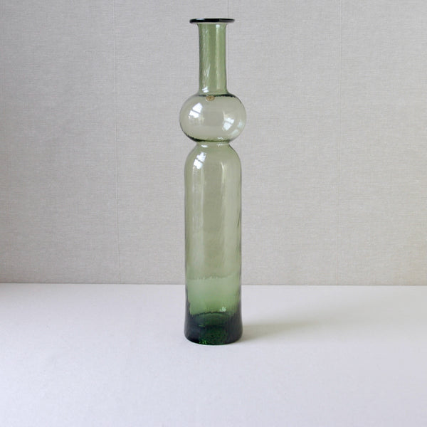 Nanny Still Neptuna pale green glass vase produced by Riihimaki in the 1960s, featuring a subtle optical-mould texture, perfect for Scandinavian design lovers.