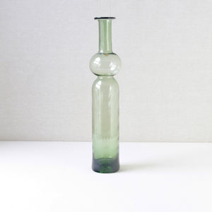 1960s Nanny Still Neptuna vase with optical mould texture in green, produced by Riihimaen Lasi Oy, showcasing mid-century Scandinavian design.