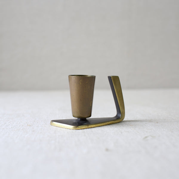 A vintage 1950s brass candle holder by Karl Hagenauer, blending Art Deco and Modernist styles. This Vienna-crafted piece is a fine example of mid-century Austrian metal artistry and is highly collectible.