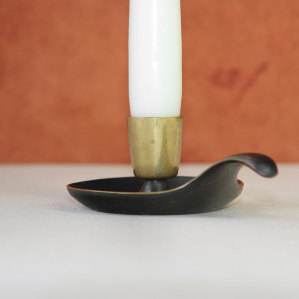 Mid-century Viennese brass candle holder by Karl Hagenauer, showcasing minimalist modernist design. A coveted 1950s piece for collectors.