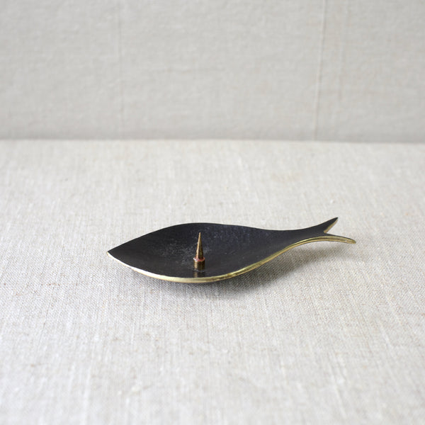 This rare fish candle holder by Walter Bosse was made from brass in the 1950s and produced by Herta Baller in Vienna. A stunning example of Bosse’s Modernist design aesthetic.