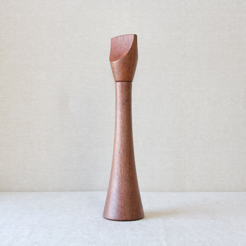 Profile image of a very tall solid teak wood pepper mill designed by Jens Quistgaard, this model is referred to as the "Screwdriver" because of the shape of the head. This is an early design from the late-1950s.