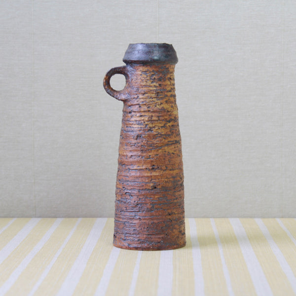 Scandinavian vintage vase by Annikki Hovisaari with bold, earthy tones. Collectible ceramic from Arabia Finland, a chic 1970s art piece. For sale in London UK from Nordic design gallery Art & Utility.