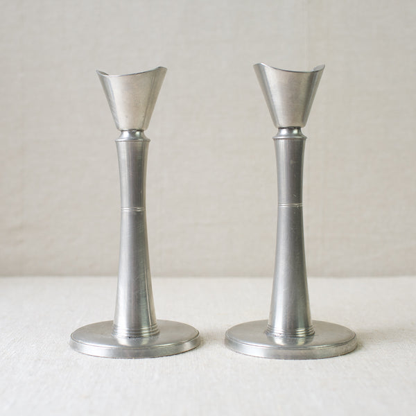 Antique mid-century GAB Tenn pewter candlesticks for sale in London at Art & Utility. Exemplifying the refined elegance of Swedish Grace, perfect for collectors.