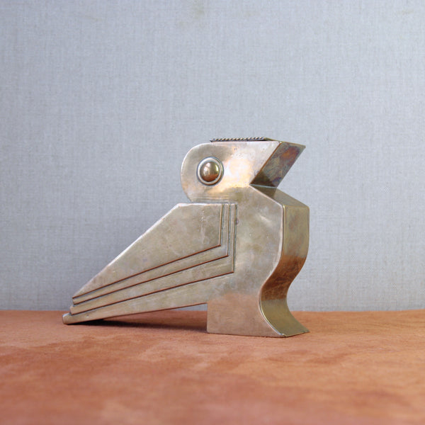 Vintage Bauhaus-inspired brass bird sculpture with a geometric Art Deco design, created in Britain circa 1930.