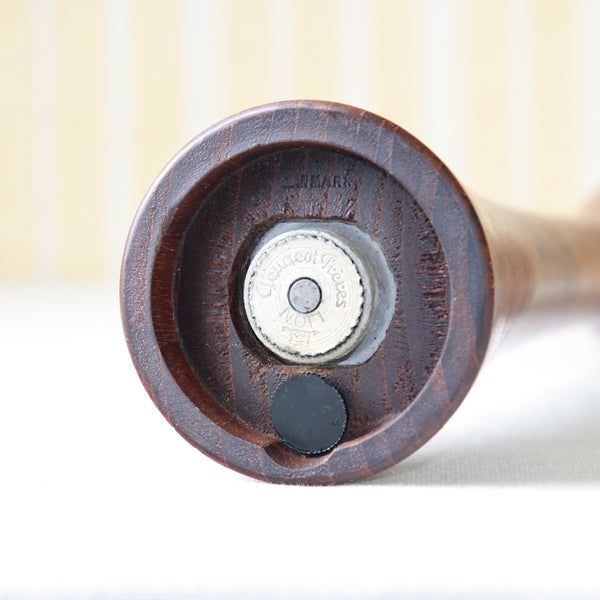 Jens Quistgaard Dansk teak pepper mills pair with unique screwdriver top. Image shows underside featuring the early grinding mechanism by Peugeot. Stamp reads 'DANMARK'.