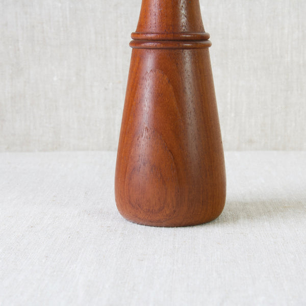 Detail of grain of wood on Danish teak peppermill designed by Jens Quistgaard 1950's