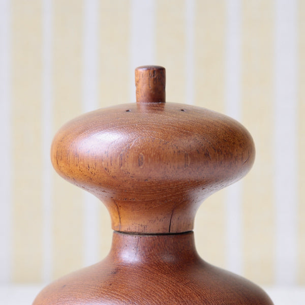 Jens Quistgaard's collectible teak model 822 salt and pepper mill, a vintage Dansk design perfect for any mid-century collection.
