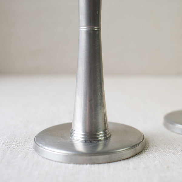 Collectible Swedish Grace pewter candlesticks by GAB Tenn, available for sale at Art & Utility. A beautiful addition to any Scandinavian or mid-century modern collection.