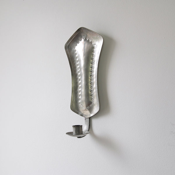 Rhombus-shaped pewter wall sconce, a 20th-century Finnish pewter piece inspired by mid-century Scandinavian design.