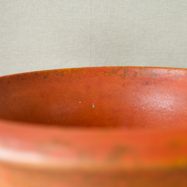 Early 20th-century Kähler Pottery floor vase with striking orange uranium glaze.