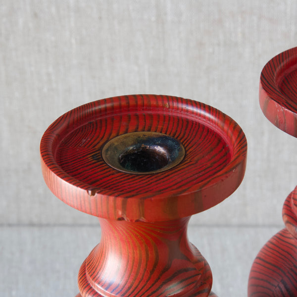 Detail of metal candle holder in traditional Swedish crafts pine candlestick
