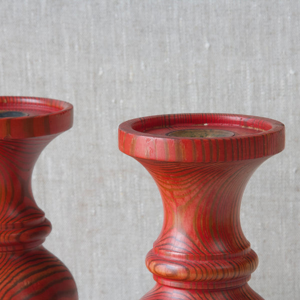 Detail of red stained pine candlesticks from Boda Tra, Sweden