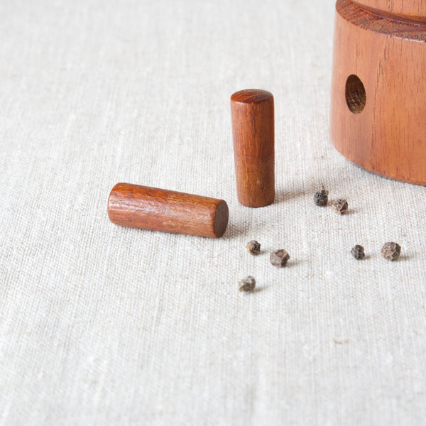 Detail of Dansk Design IHQ pepper mill teak plugs for pepper holes