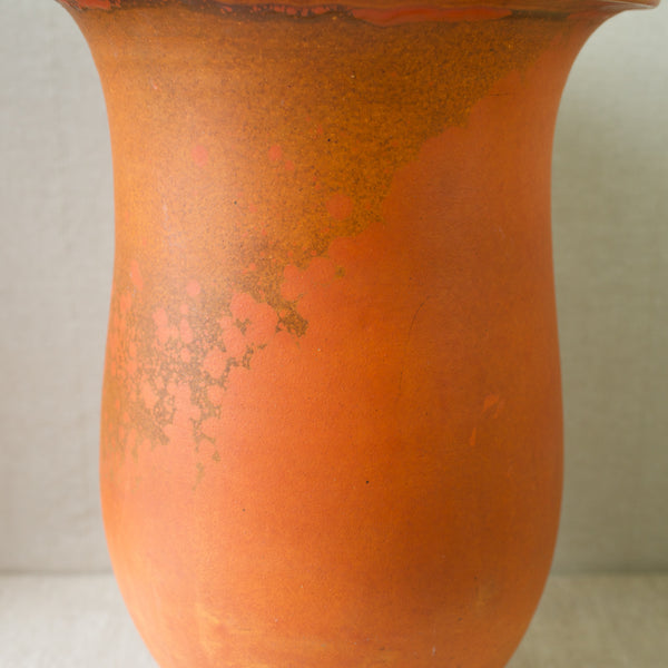 A large uranium-glazed baluster vase from early 20th-century Kähler Pottery, a masterpiece of Danish ceramics.