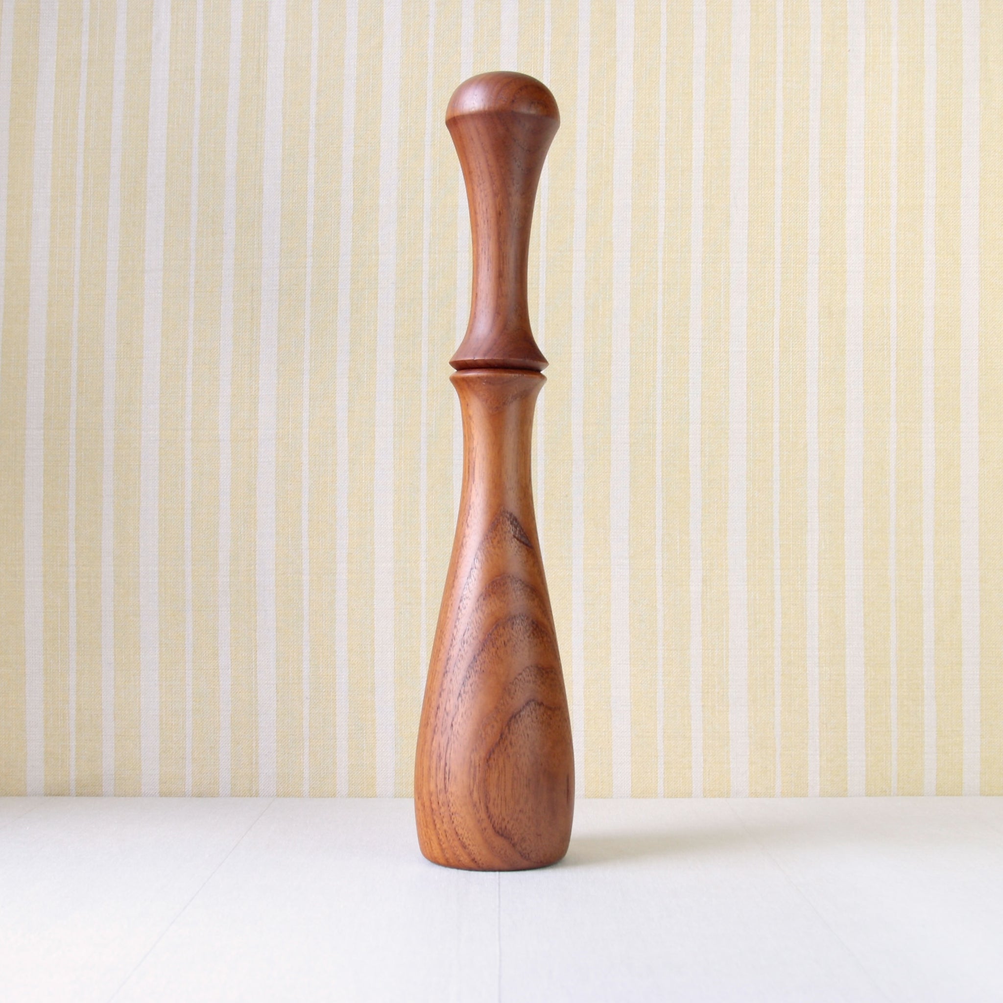 Profile image of a tall and sculptural collectible Danish Jens Quistgaard 893 pepper mill, a rare Scandinavian design crafted from solid teak. For sale in the UK. Available for worldwide delivery.