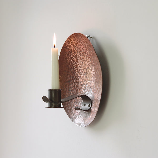 Handcrafted copper sconce from early 20th-century Britain, a unique piece of the arts & crafts movement.