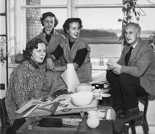 Historic photograph of Kaj Franck's design team at Arabia, Finland. Franck was then the artistic director at the Arabia ceramics workshop. Pictured: Kaarina Aho, Saara Hopea, Ulla Procope and Kaj Franck.