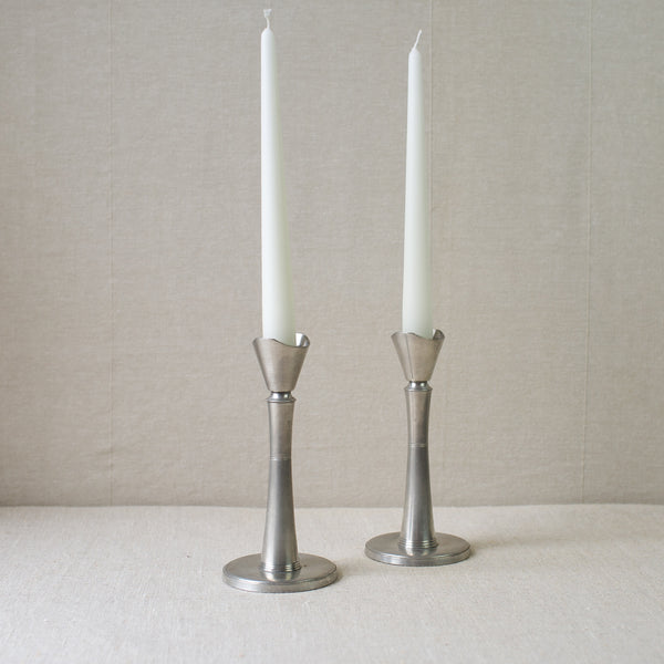 Swedish Grace Art Deco pewter candlesticks by GAB Tenn. Antique Scandinavian design available for sale in London at Art & Utility. Perfect for collectors.