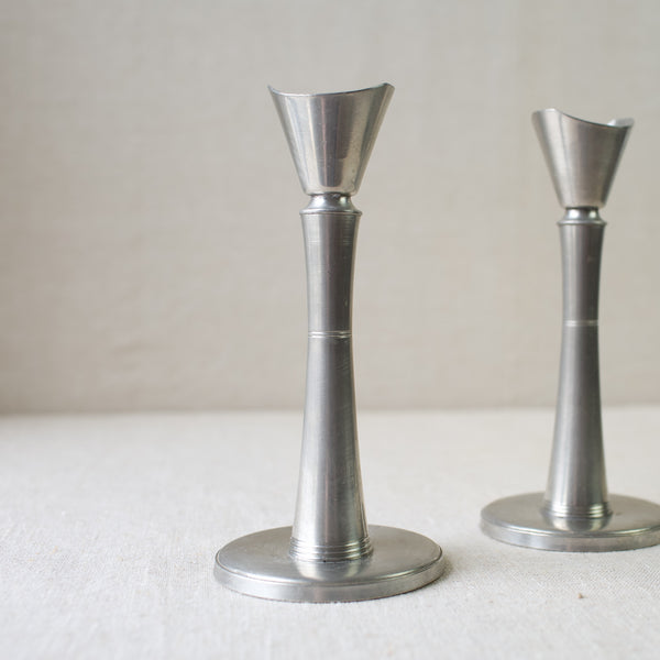 Vintage pewter candlesticks by GAB Tenn in the Swedish Grace style. Iconic Scandinavian design, available for sale from Nordic design gallery Art & Utility.