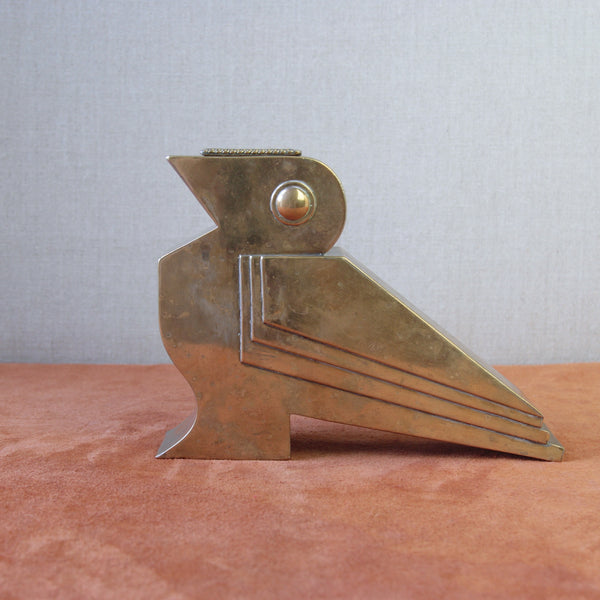 Large 1930s Art Deco bird sculpture with Egyptian motifs, handmade in brass. A rare and collectible piece for vintage design lovers.