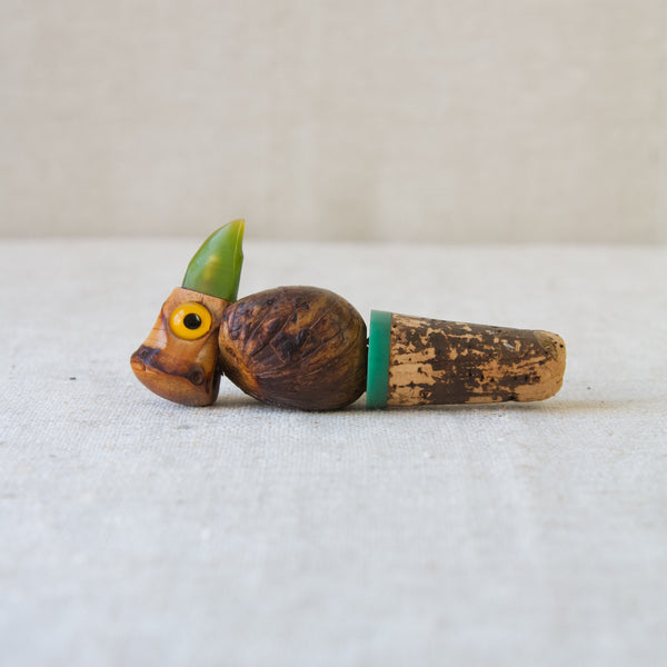 YZ nut bird bottle stopper produced by Henry Howell for Alfred Dunhill, 1920's London.