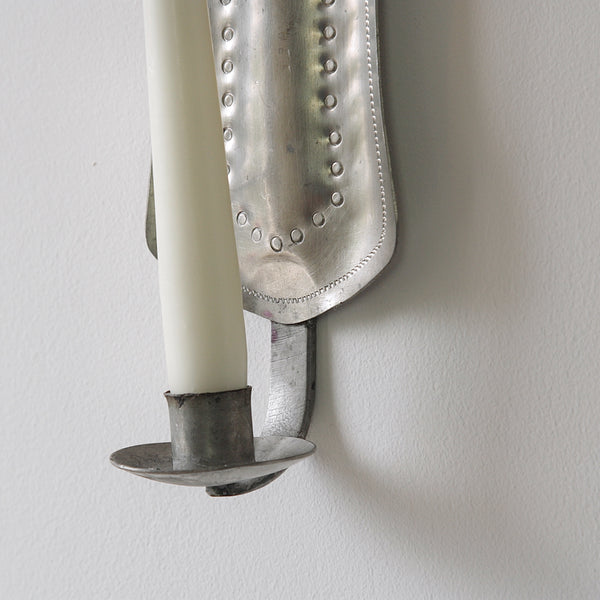 Zigzag pattern pewter wall sconce, a 20th-century Finnish pewter piece inspired by Paavo Tynell and nordic design.