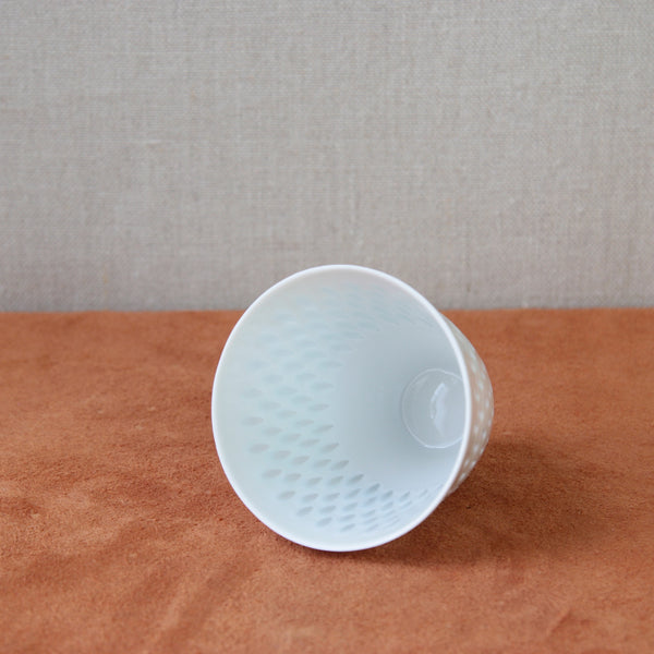 Handmade porcelain vase from 1955 featuring the rice technique by Friedl Holzer-Kjellberg, highlighting exceptional craftsmanship and design. Available at Art & Utility in London.