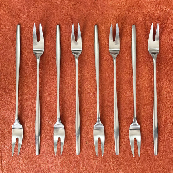 Dansk Designs rare 80-piece Variations V cutlery collection by Jens Quistgaard, featuring Scandinavian design and mid-century modern aesthetics.
