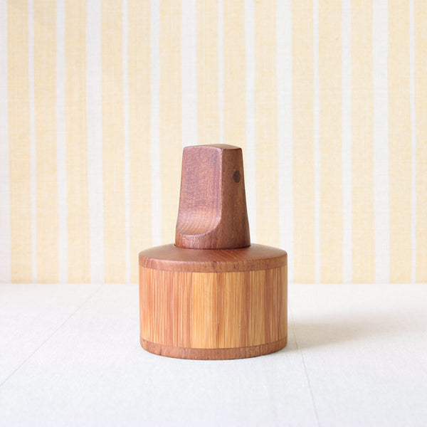 Rare Scandinavian bamboo screwdriver pepper mill designed by Jens Quistgaard, showcasing mid-century Nordic design. For sale from Art & Utility, a vintage Scandinavian design gallery based in London, shipping worldwide.