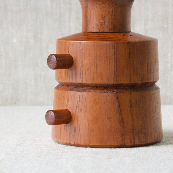 Detail of plugs on Jens Quistgaard Dansk Designs vintage peppermill made from teak wood designed in 1960