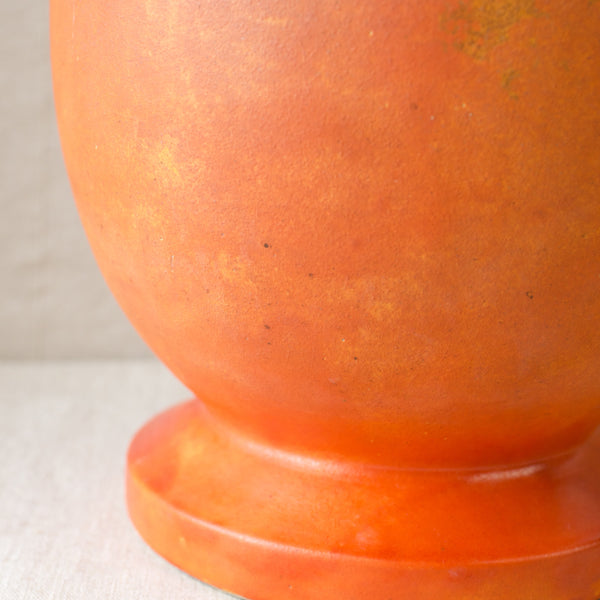 Close up of foot with uranium glaze on an iconic Danish ceramic floor vase with uranium glaze by Kähler Pottery.