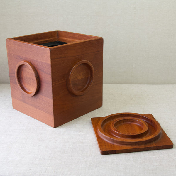 Mid Century Modern 1960's staved teak ice bucket designed by Jens Quistgaard for Dansk Designs in the shape of a cube.
