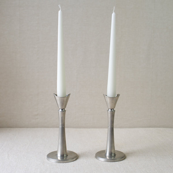 Antique Swedish Grace pewter candlesticks by GAB Tenn, available for sale at Art & Utility. Perfect for adding a touch of Scandinavian elegance to any home.