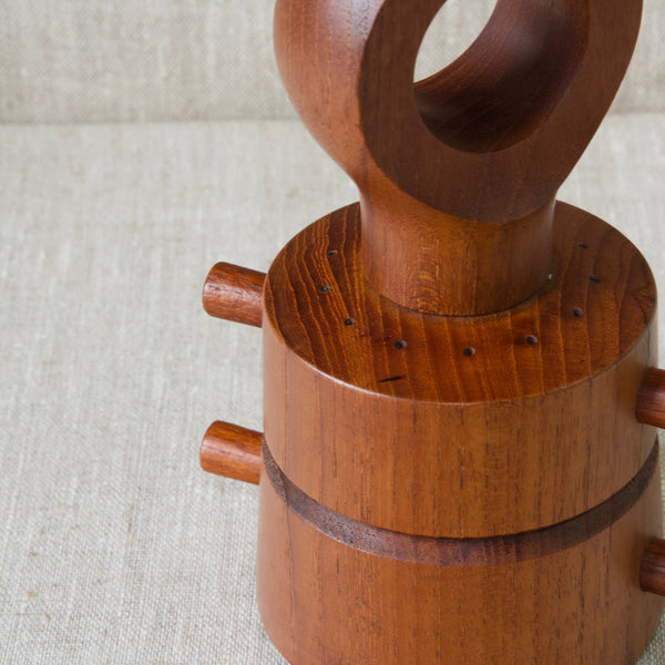 Collectable Danish teak design by Jens Quistgaard, a pepper mill in eyelet form