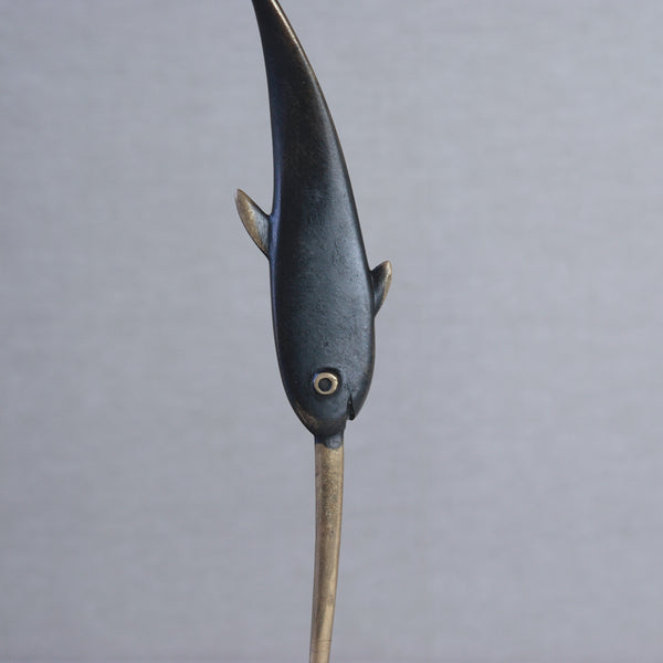 Collectible Richard Rohac narwhal letter opener in polished brass. A rare midcentury piece that adds sophistication to any desk. For sale in the UK from design gallery Art & Utility.