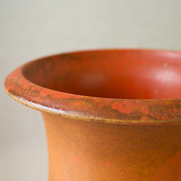 Art Deco elegance: an orange-glazed 'gulvvase' from Kähler Pottery, circa 1920s.