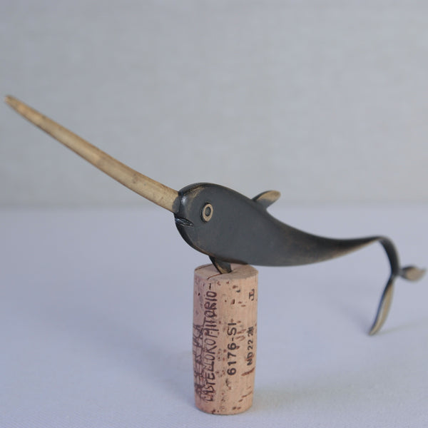 Midcentury modern brass narwhal letter opener by Richard Rohac, perfect for collectors and art enthusiasts with a taste for rare, iconic design.
