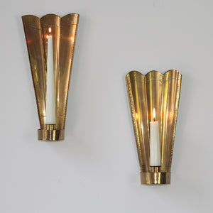 Scalloped top brass wall sconces by Carl Malmstedt, handcrafted in Ängelholm, Sweden, in 1932 and 1933, with Tre Kronor design and Pierre Forsell inspiration.